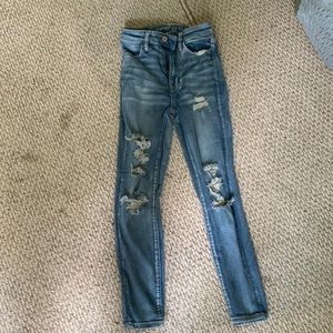 American eagle size 00 super-stretch light blue ripped jeans. High rise x-short